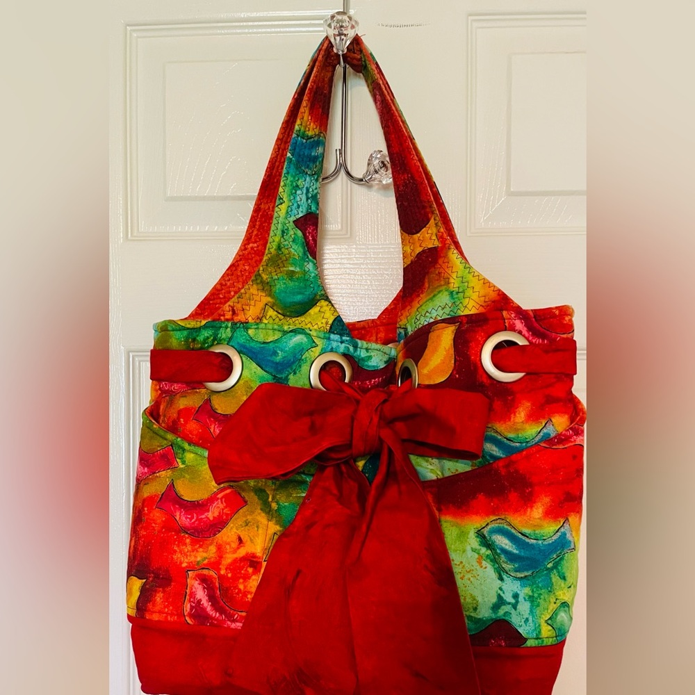 Hand made quilted Women's Tote Bag. 6 outside pockets, more inside. Red Accents
